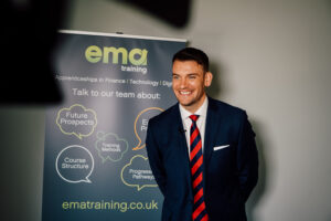 EMA Training's COO smiling into a camera