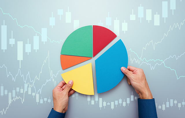 Investor managing portfolio. Pie chart and candlestick charts.