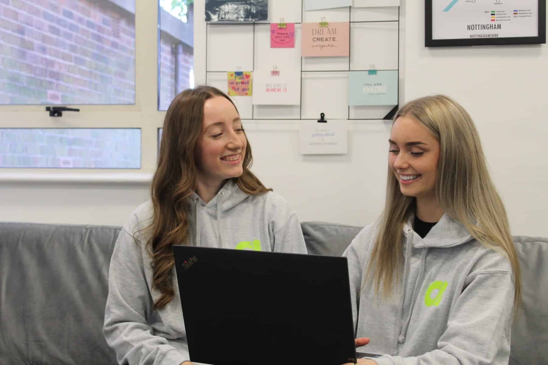 Jess and Flo in grey EMA Apprentice hoodies